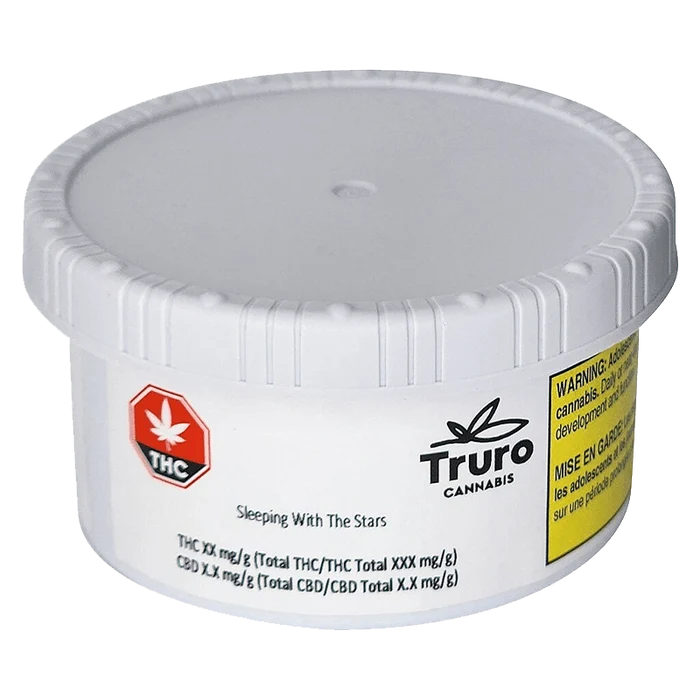 Front view of the “Sleeping With The Stars” package, displaying cannabis branding and a warning label on its white surface.