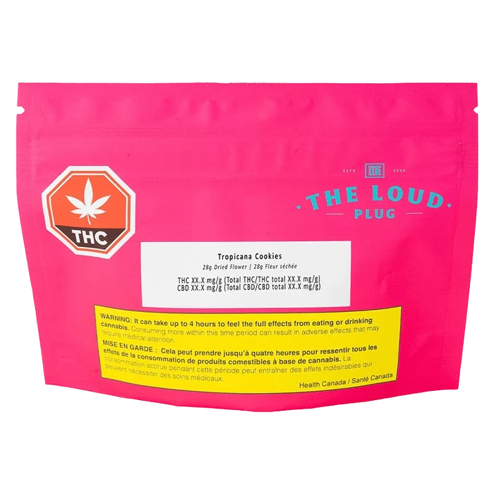 Front view of the Tropicana Cookies package with bold text and a green leaf, against a black background.