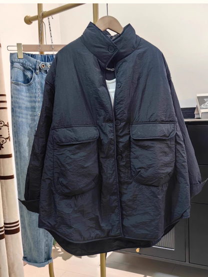 Oversized Utility Jacket with Curved Hem, Statement Pockets, Effortless Layering