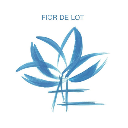 Wine bottle label with blue floral logo and 'FLOR DE LOT' text on white