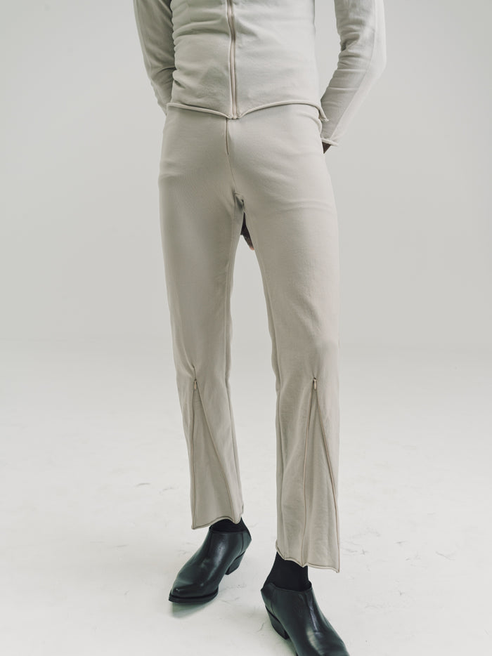 Beige Nylon No.152 Knitted Zipper Trousers | Gabriela Coll Garments | DEPARTAMENTO