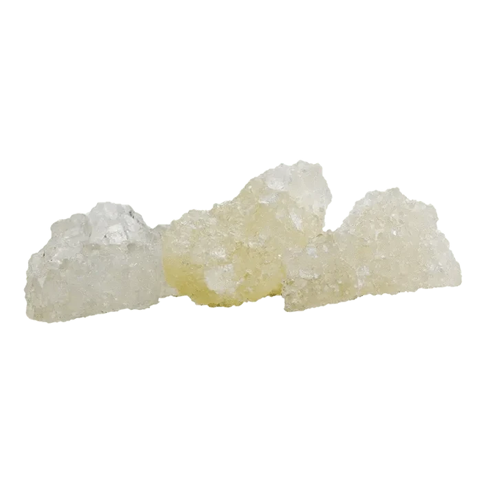 Close-up of crystallized Black Cherry Punch Diamonds with a translucent, jagged texture against a plain white background.