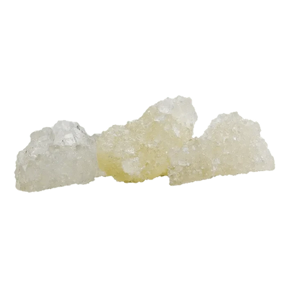 Close-up of crystallized Black Cherry Punch Diamonds with a translucent, jagged texture against a plain white background.
