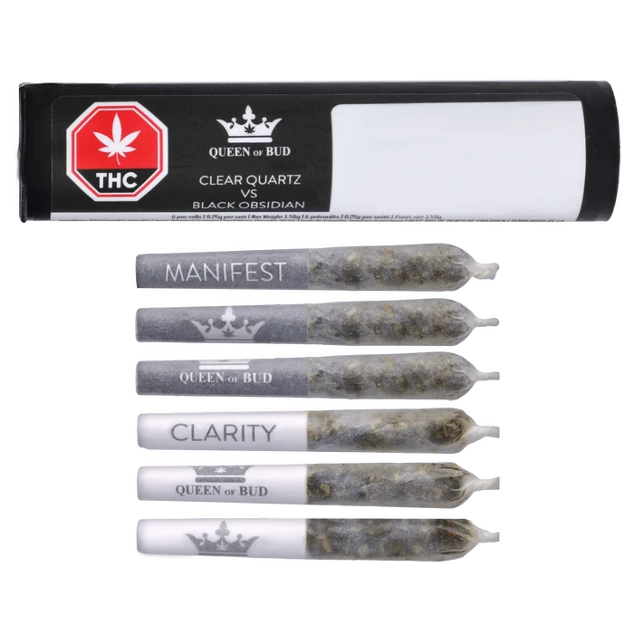 Top-down view of six pre-rolls and a black-and-white tube labeled "Clear Quartz Vs Black Obsidian Diamond Infused PR 6 x 0.25 g" by Queen of Bud.