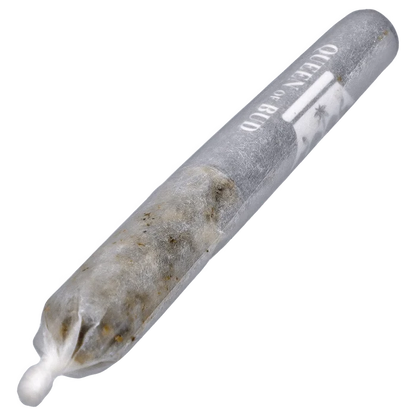 Angled close-up of a rolled joint with a white filter, labeled "Clear Quartz Vs Black Obsidian Diamond Infused PR 6 x 0.25 g" along its translucent paper.