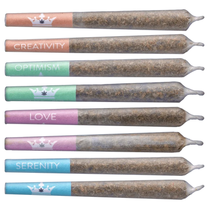A vibrant, close-up view of the Crystal Multipack Infused Pre Rolled 8 x 0.5 g, arranged in a row against a neutral background.