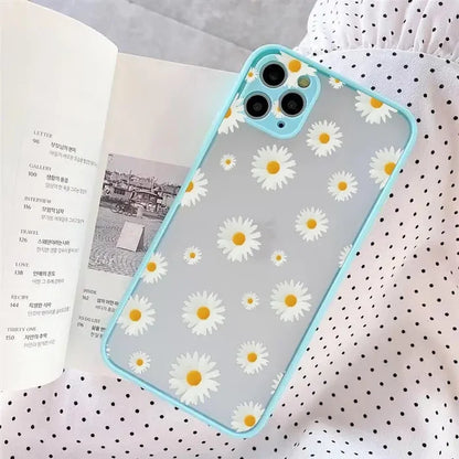 A white and yellow daisy print phone case