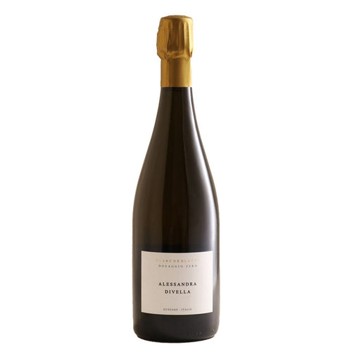 Sparkling wine bottle with gold foil capsule and front label on dark glass