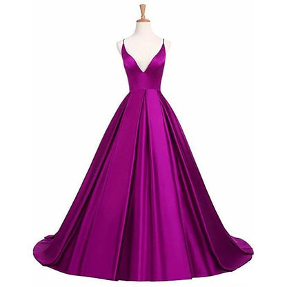 Elegant purple wedding dress with a deep V-neckline and flowing skirt, ideal for elegant formal gowns for prom.