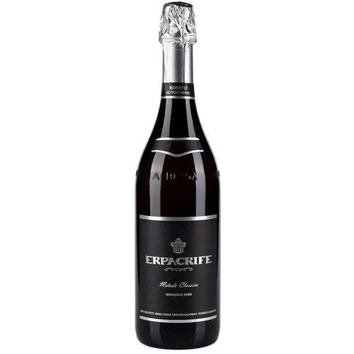Sparkling wine bottle with dark glass, silver foil capsule, branded label