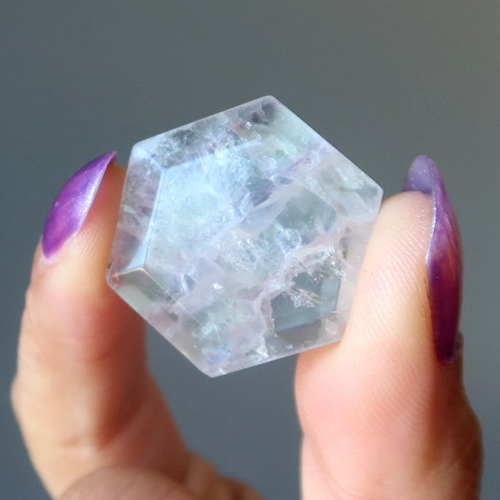 holding Green Faceted Hexagon Fluorite