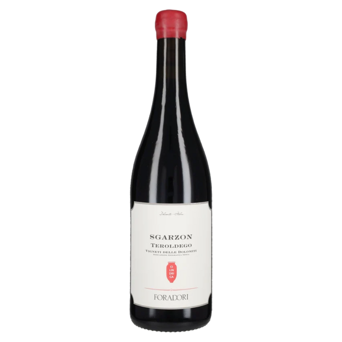 Foradori Teroldego wine bottle with red foil and cream label