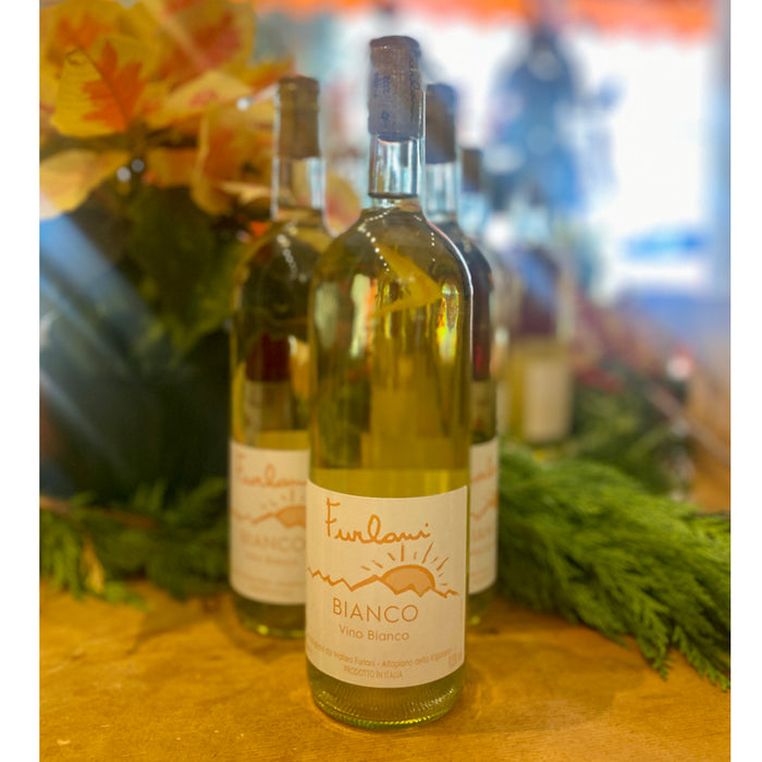 Furlani Bianco wine bottles, front bottle with beige label and cork