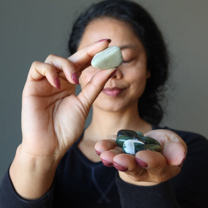 sheila of satin crystals meditating with Green Jasper Tumbled Stones