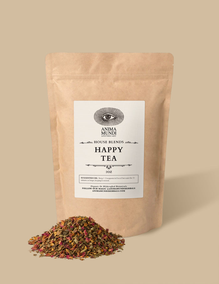 Tea package labeled 'Happy Tea' with loose tea leaves on a beige background