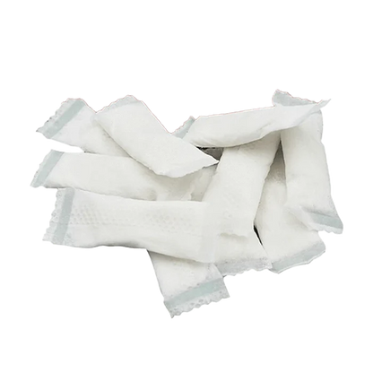 A close-up shot of several Hot Cinnamon Chillows Pouches laid out against a plain white background.