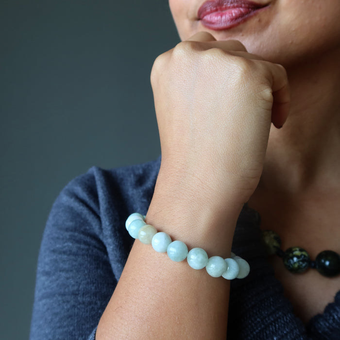 female wearing jade bracelet