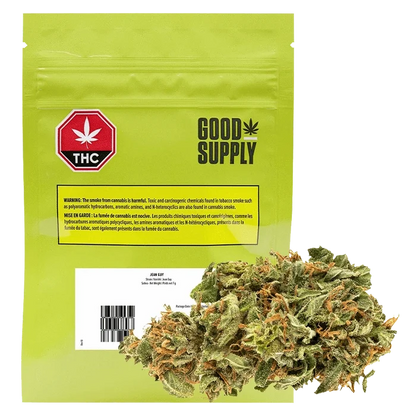 A close-up shot of the “Jean Guy” packaging with a warning label against harmful chemicals and THC symbol.