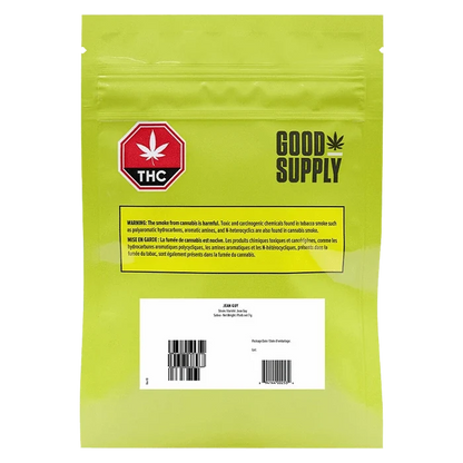 Front view of the “Jean Guy” packaging featuring a warning label about harmful chemicals, with a bold graphic element.