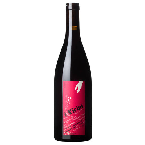 Red-labeled red wine bottle with dark glass and black cap