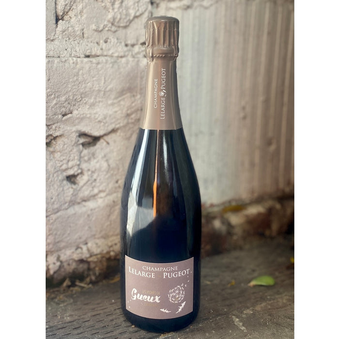LeLarge Pugeot Gueux Extra Brut 2016 champagne bottle, dark foil label and neck wrap