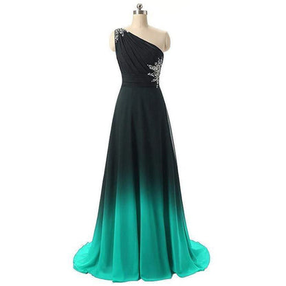 Elegant one-shoulder long evening gown for weddings in black and teal with stunning embellishments
