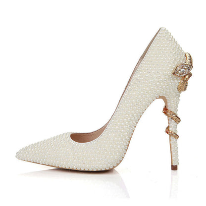Tucomosi pearl embellished pointed toe pumps in white with elegant beaded details and stylish heel design