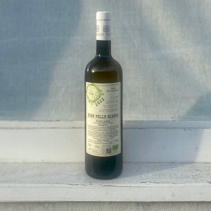 Front-labeled Sine Felle Bianco white wine bottle, amber glass