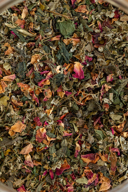 Close-up of a mix of dried herbs and flowers in a bowl