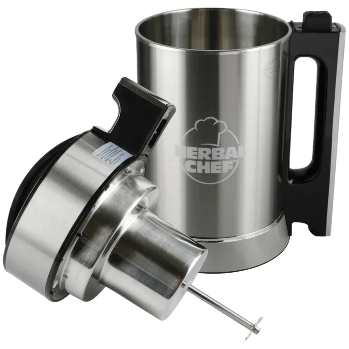 A silver, front view of the Pulsar Herbal Chef Electric Butter Infuser, featuring a sleek cylindrical shape and a handle on the side.
