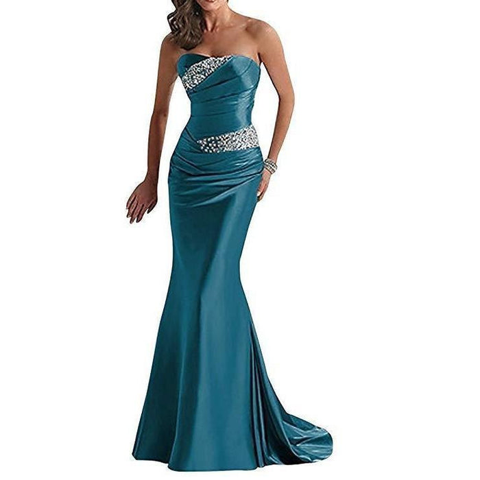 Elegant beaded mermaid evening dress in teal with a strapless design and fitted silhouette