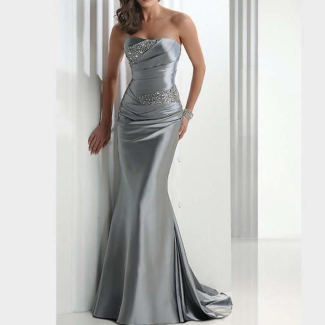 Silver beaded mermaid evening dress with a strapless design and figure-flattering silhouette