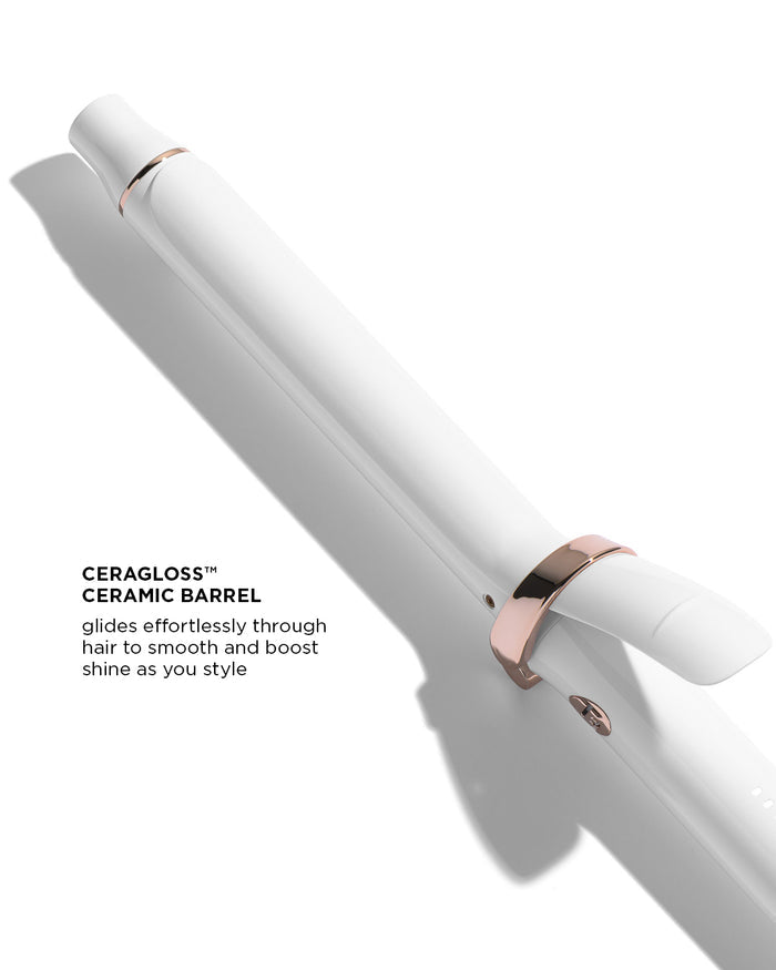 Hair curler with rose gold accents on a white background