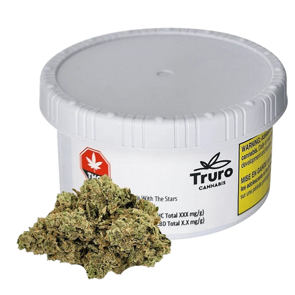A close-up of the Sleeping With The Stars cannabis, showcasing a vibrant, textured bud against a branded background.