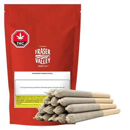 A close-up of the Strawberry Amnesia Joints Pre Rolled 14 x 0.5 g package with a red and white label, showing the branding and product details.