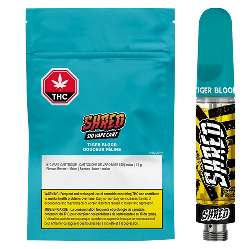 Close-up of the Tiger Blood Vape Cartridge packaging featuring bold text and a warning against cannabis-related health risks.