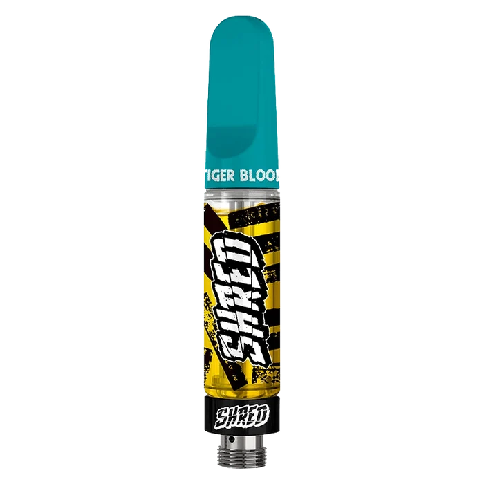 Front view of the Tiger Blood Vape Cartridge with a sleek, cylindrical shape and colorful branding against a plain white background.