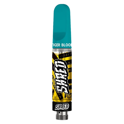 Front view of the Tiger Blood Vape Cartridge with a sleek, cylindrical shape and colorful branding against a plain white background.