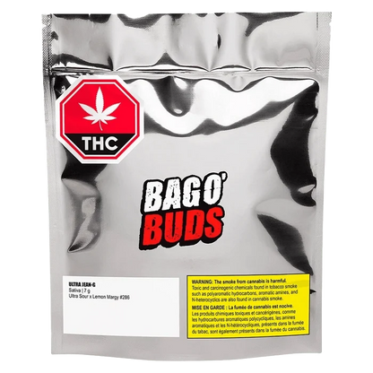 Close-up of the "Ultra Jean-G" packaging, featuring bold typography and a cannabis leaf against a dark background.